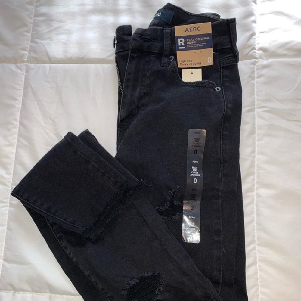 Black, distresses jeans/jeggings